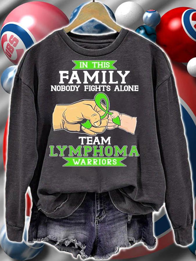 In this family nobody fights alone team lymphoma warriors green ribbon shirt sweatshirt