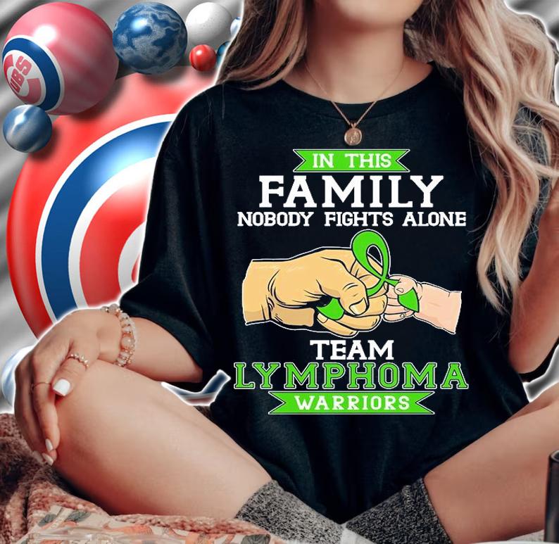 In this family nobody fights alone team lymphoma warriors green ribbon shirt woman shirt